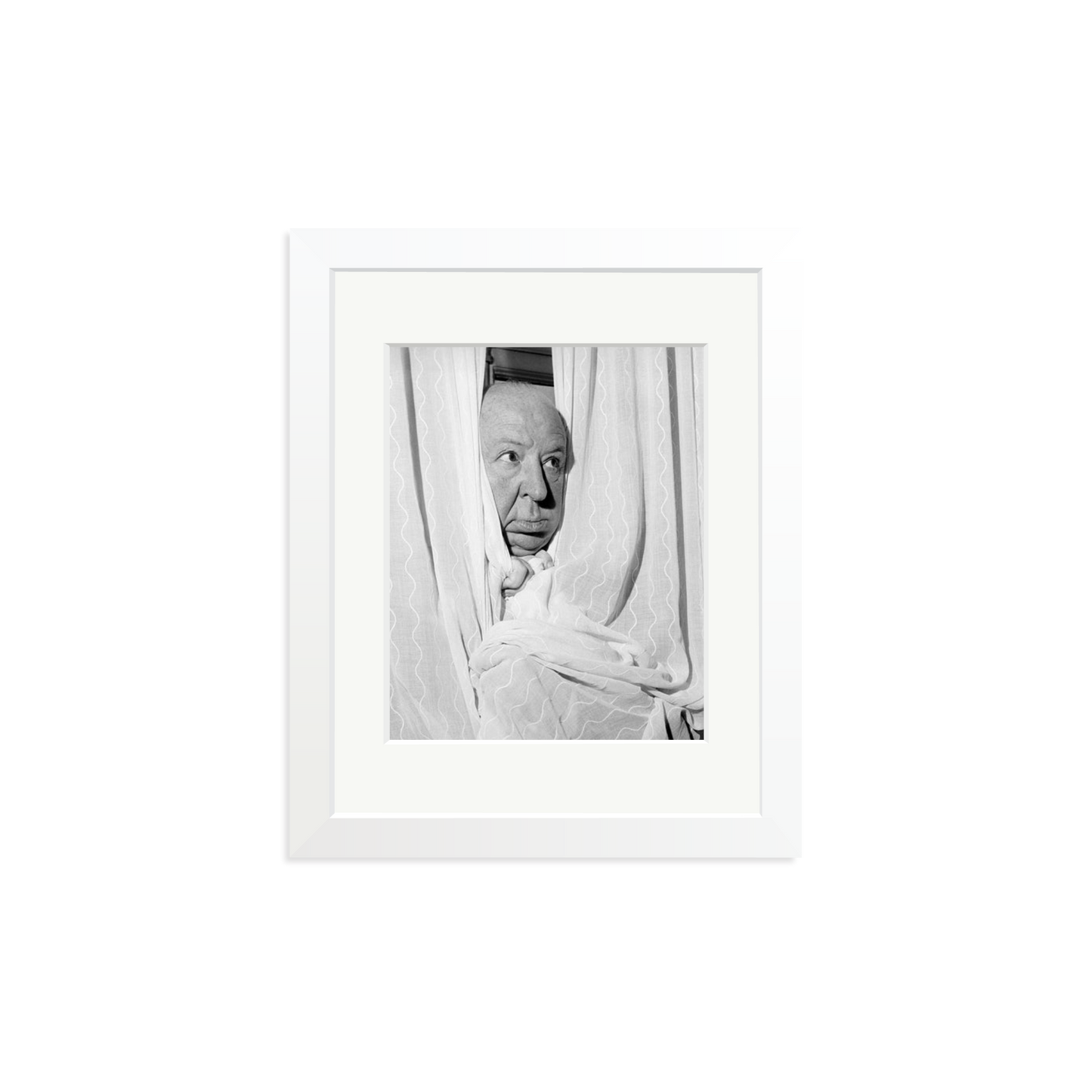 Alfred Hitchcock at the Claridges Hotel Framed Print