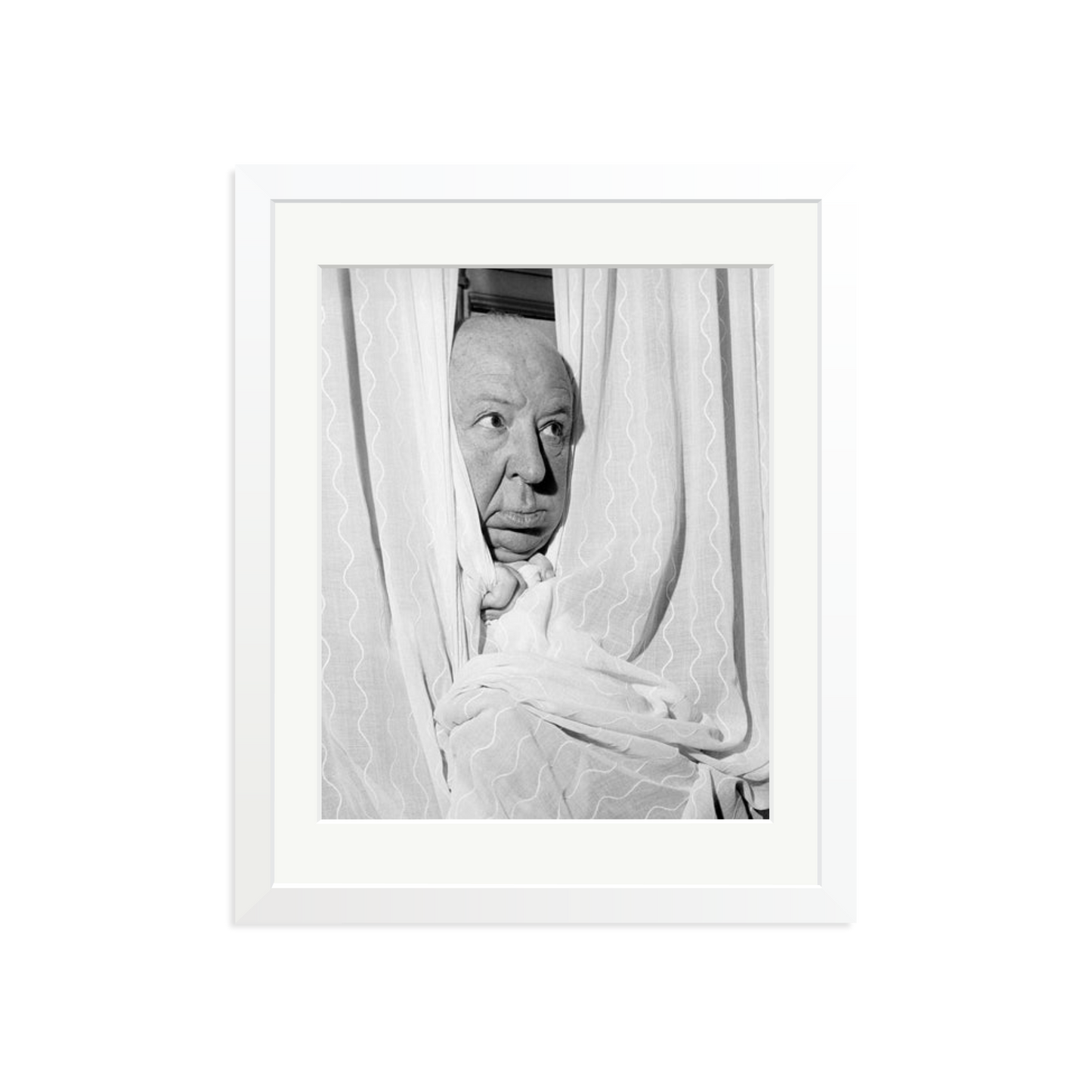 Alfred Hitchcock at the Claridges Hotel Framed Print