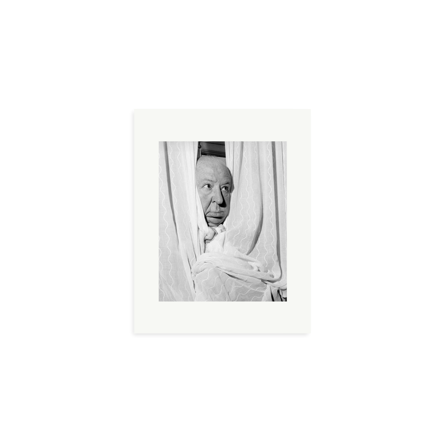 Alfred Hitchcock at the Claridges Hotel Framed Print