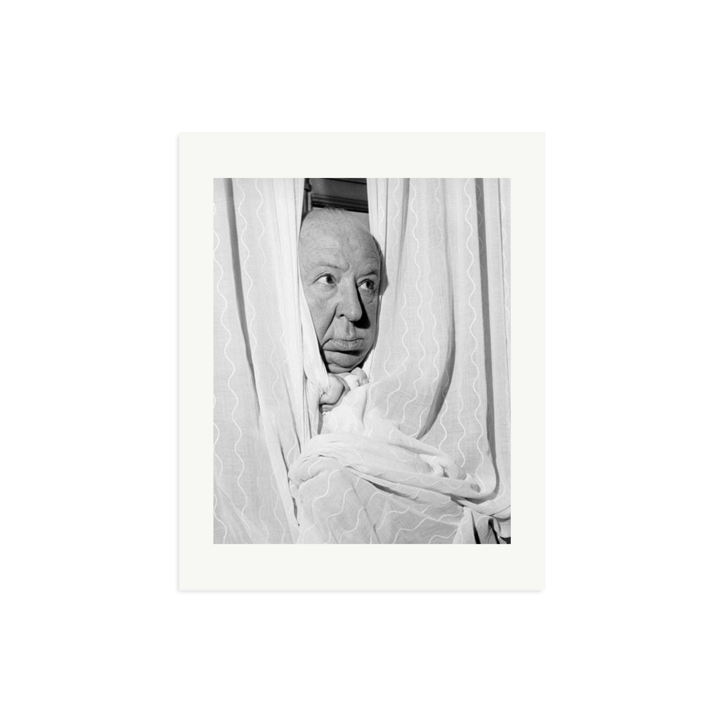 Alfred Hitchcock at the Claridges Hotel Framed Print
