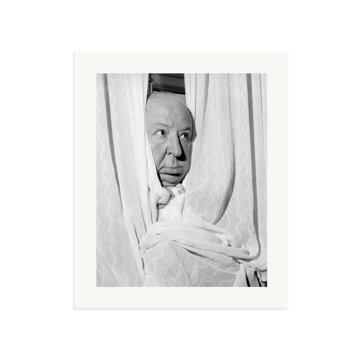 Alfred Hitchcock at the Claridges Hotel Framed Print