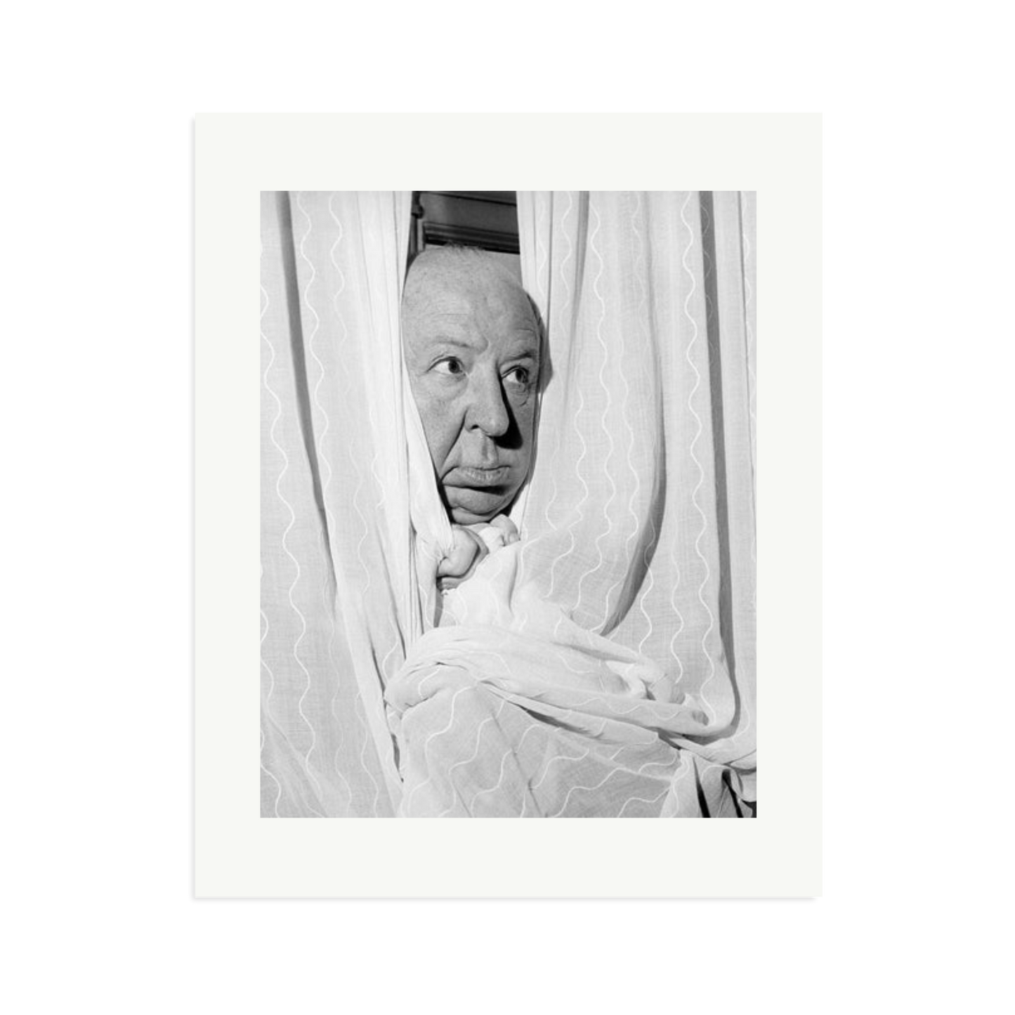 Alfred Hitchcock at the Claridges Hotel Framed Print