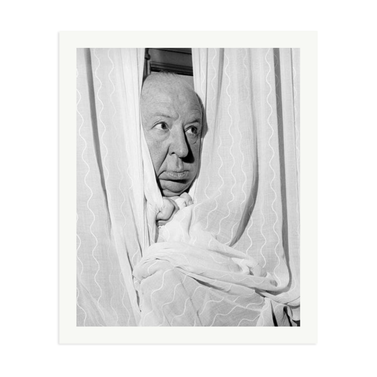 Alfred Hitchcock at the Claridges Hotel Framed Print