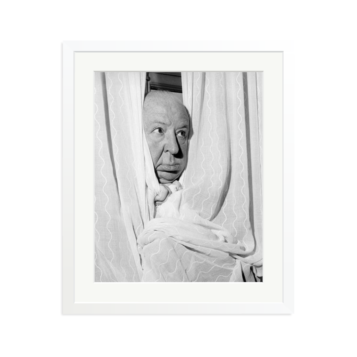 Alfred Hitchcock at the Claridges Hotel Framed Print