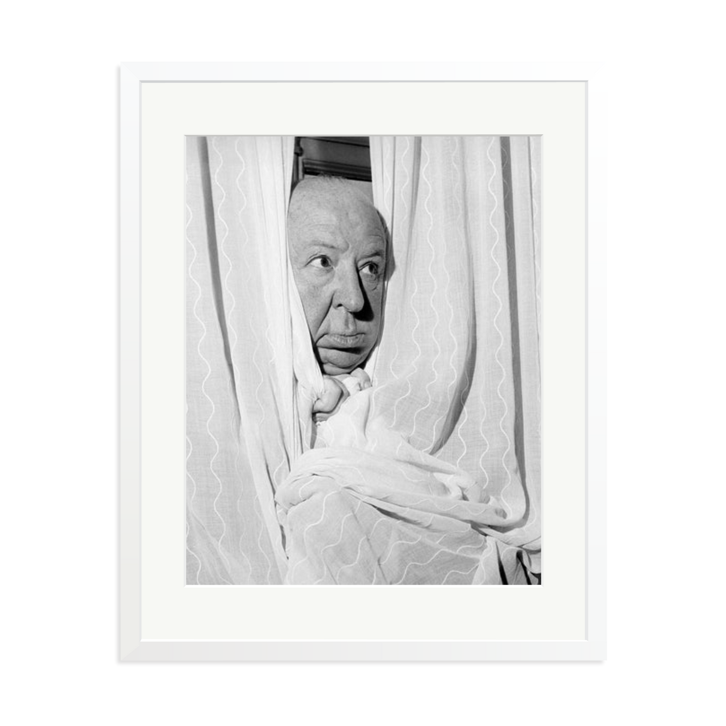 Alfred Hitchcock at the Claridges Hotel Framed Print