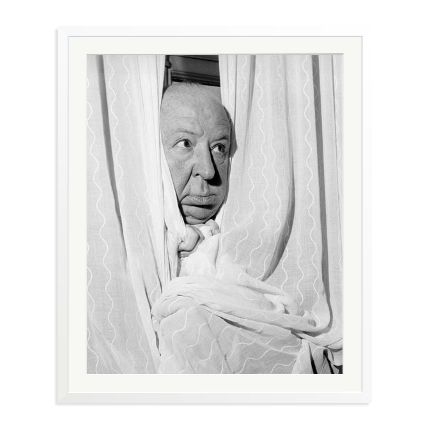 Alfred Hitchcock at the Claridges Hotel Framed Print