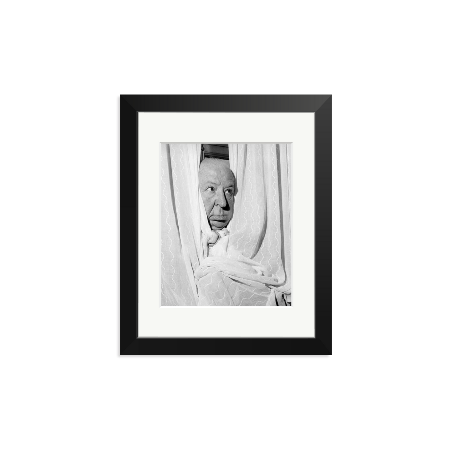 Alfred Hitchcock at the Claridges Hotel Framed Print