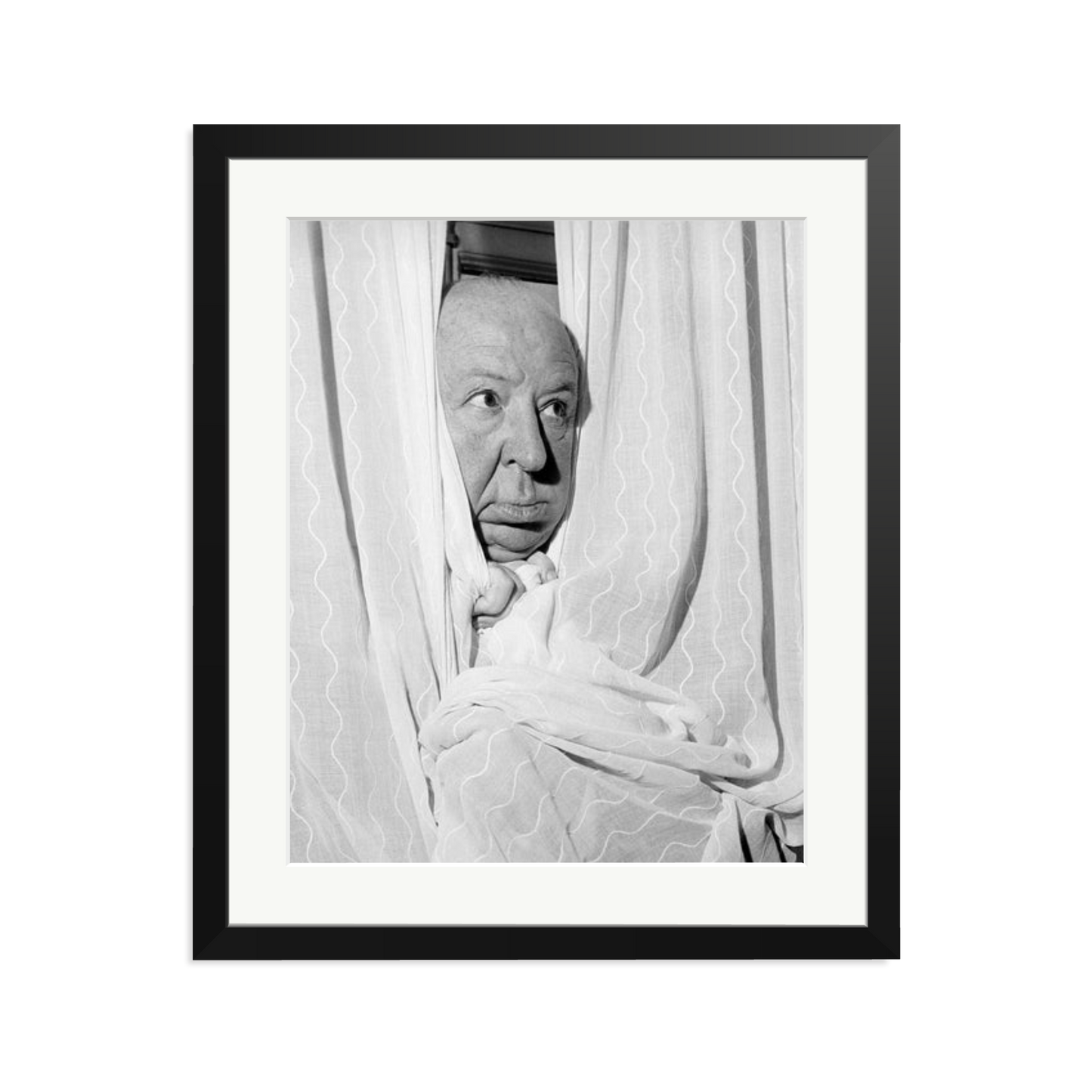 Alfred Hitchcock at the Claridges Hotel Framed Print