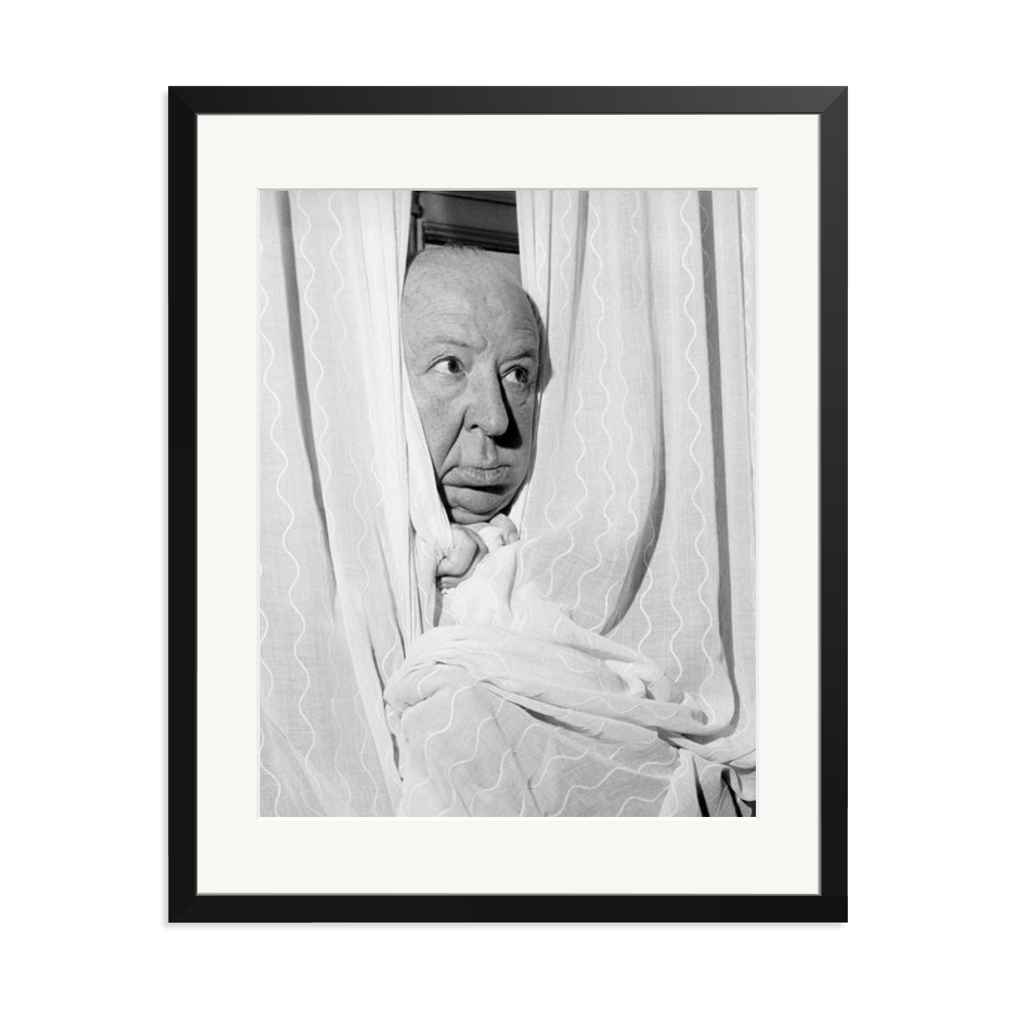 Alfred Hitchcock at the Claridges Hotel Framed Print