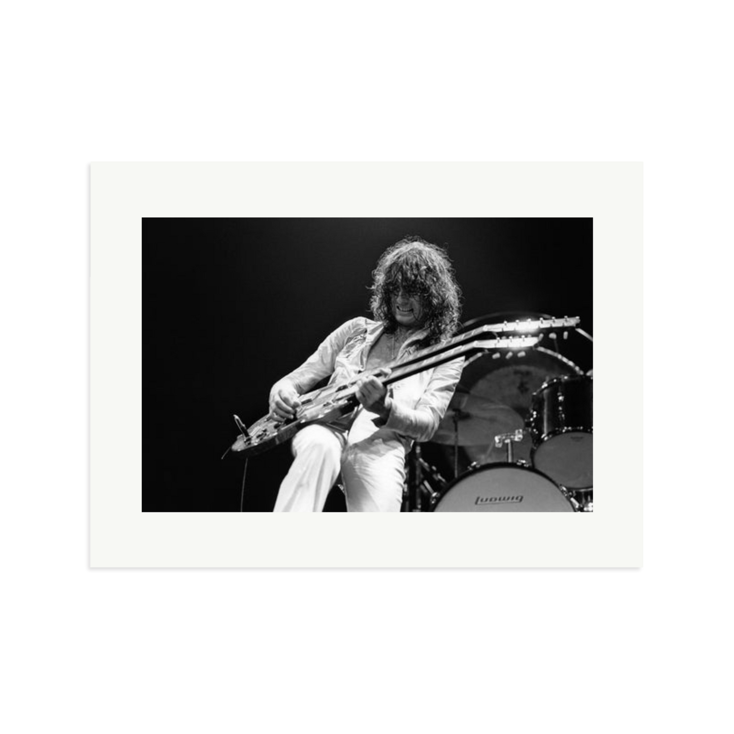Jimmy Page playing on tour 1977 Framed Print