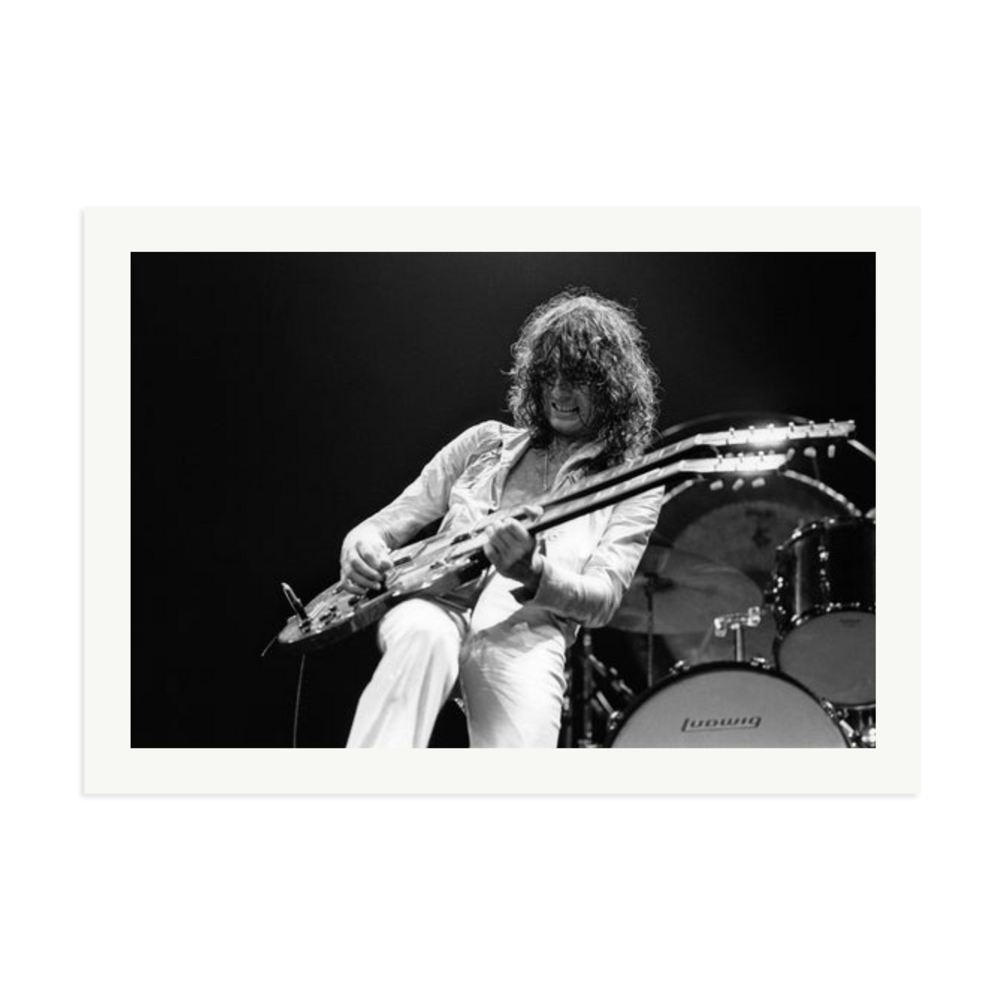 Jimmy Page playing on tour 1977 Framed Print