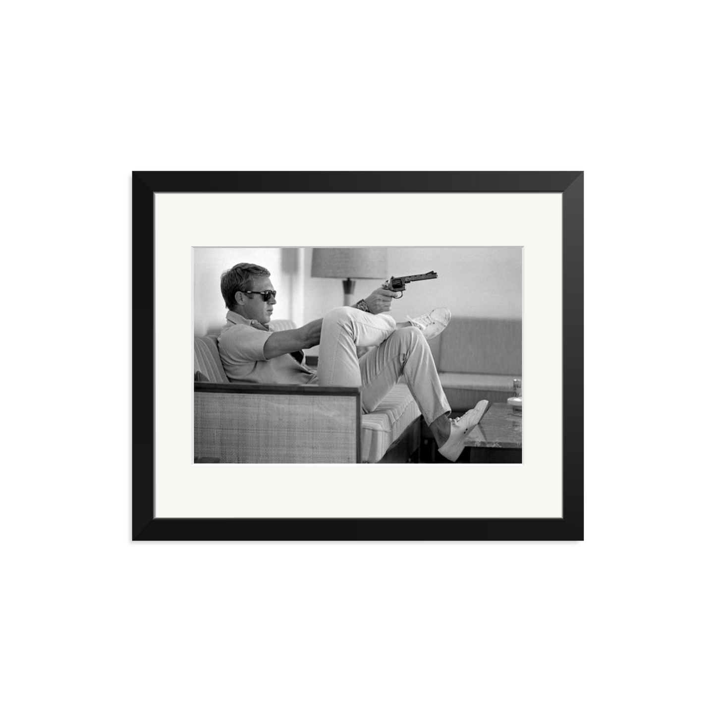 Steve McQueen Aims a Pistol Framed Print