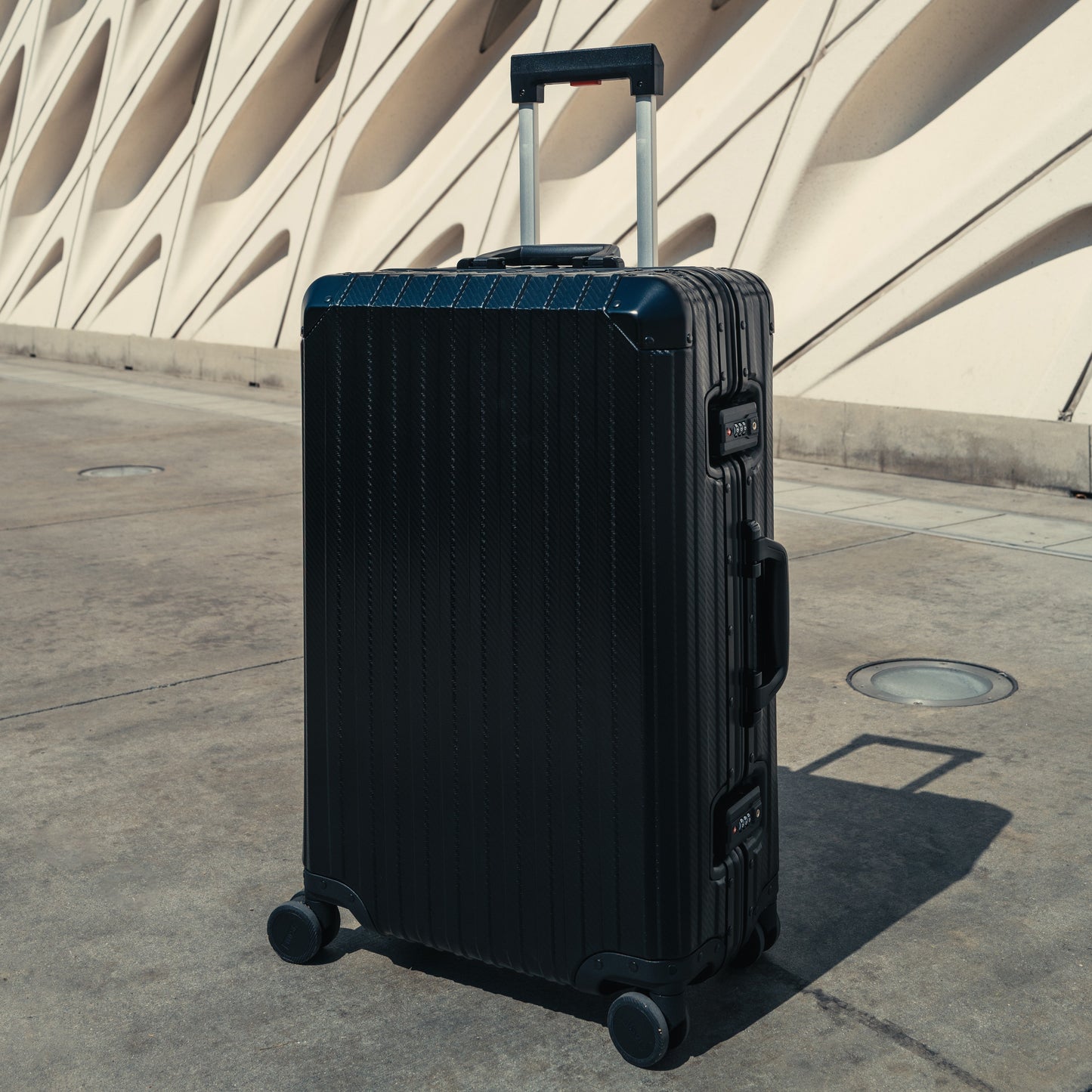 TREVA Aluminum Black Suitcase