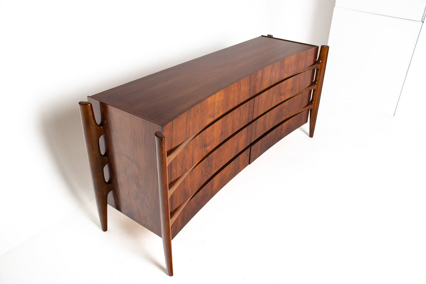 William Hinn Sculpted Walnut 8 Drawer Dresser, Made in Sweden, Circa 1950s