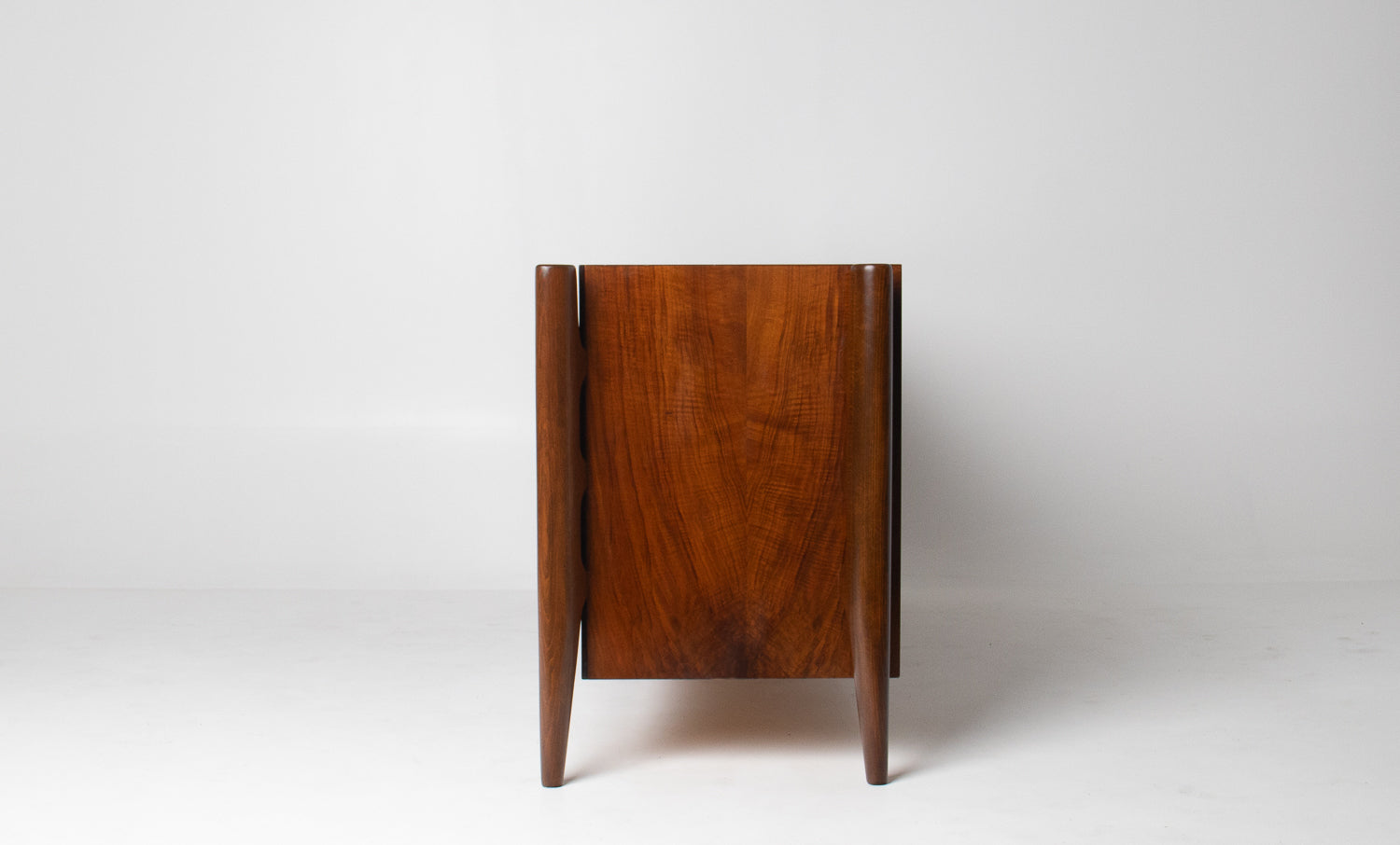 William Hinn Sculpted Walnut 8 Drawer Dresser, Made in Sweden, Circa 1950s