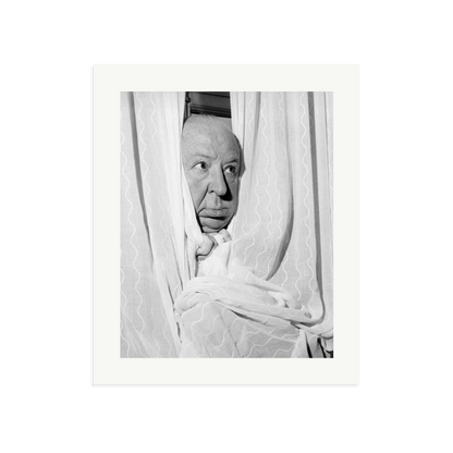 Alfred Hitchcock at the Claridges Hotel Framed Print