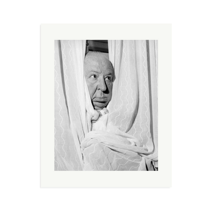 Alfred Hitchcock at the Claridges Hotel Framed Print