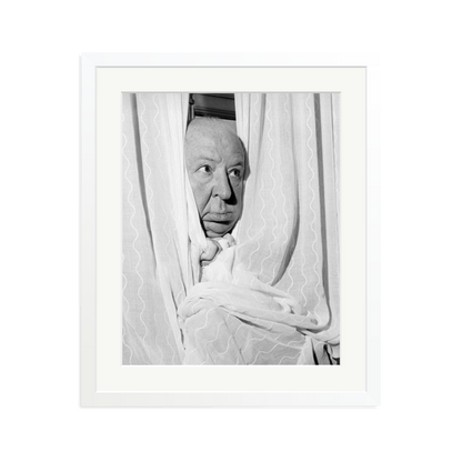 Alfred Hitchcock at the Claridges Hotel Framed Print
