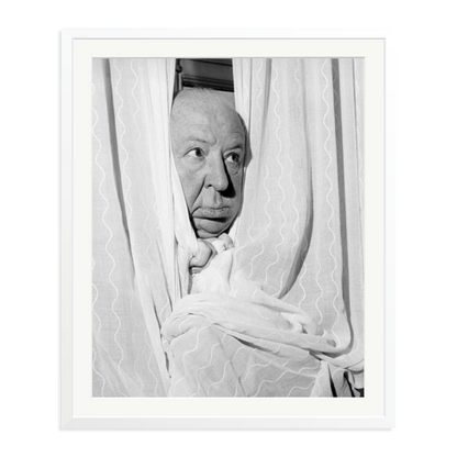 Alfred Hitchcock at the Claridges Hotel Framed Print