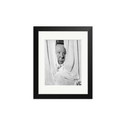 Alfred Hitchcock at the Claridges Hotel Framed Print