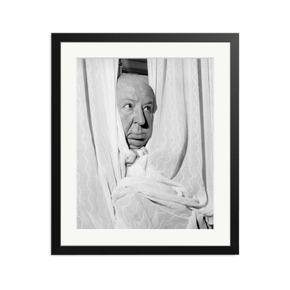 Alfred Hitchcock at the Claridges Hotel Framed Print