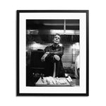 Anthony Bourdain in the Kitchen Framed Print - Black