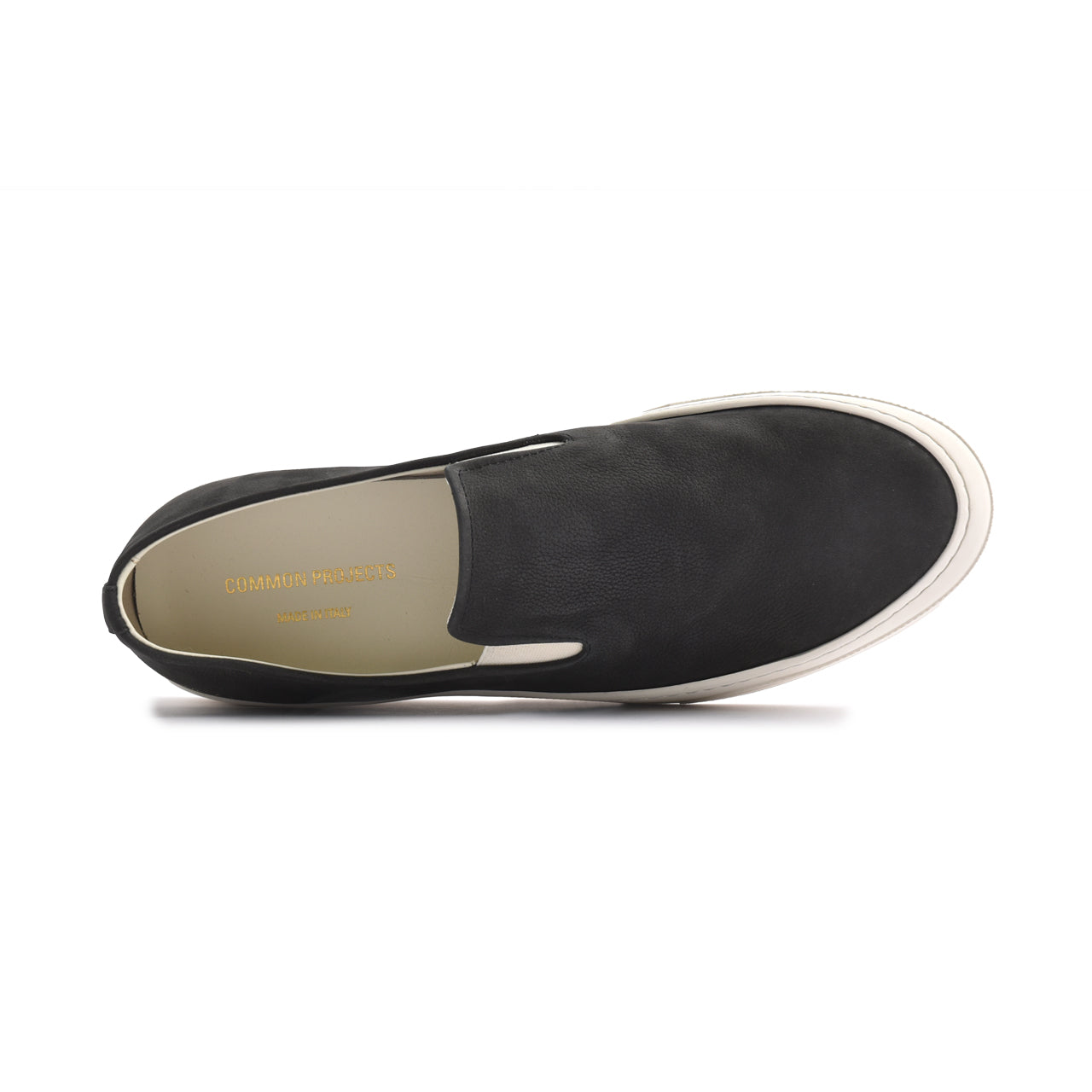 Common projects black slip on sale on