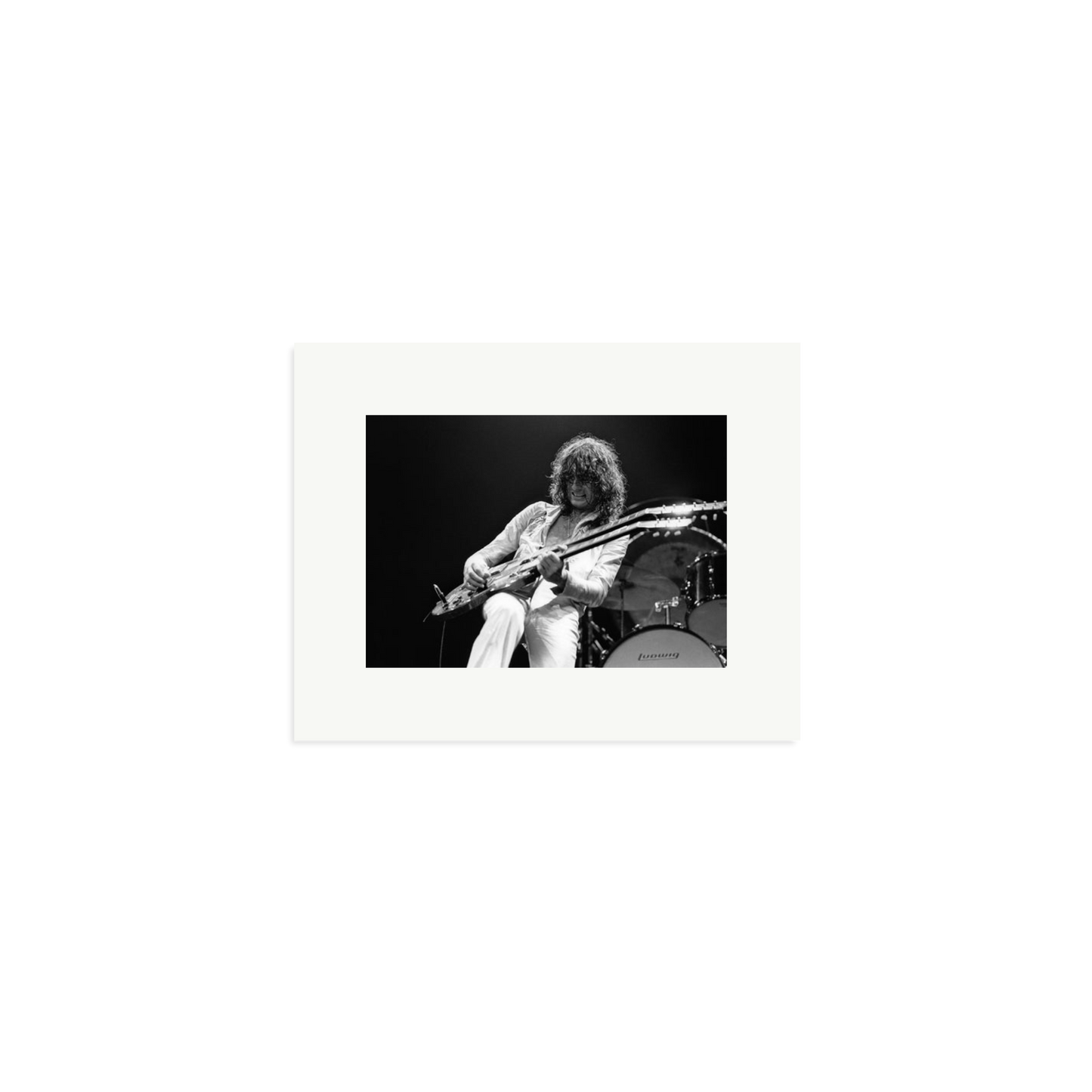 Jimmy Page playing on tour 1977 Framed Print