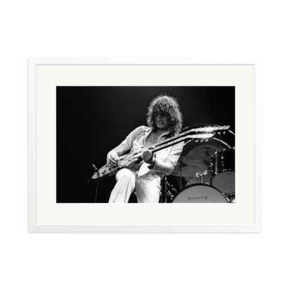 Jimmy Page playing on tour 1977 Framed Print