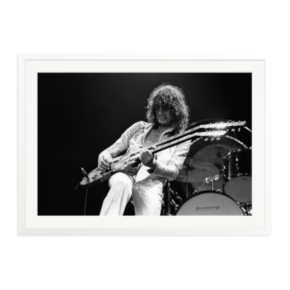 Jimmy Page playing on tour 1977 Framed Print