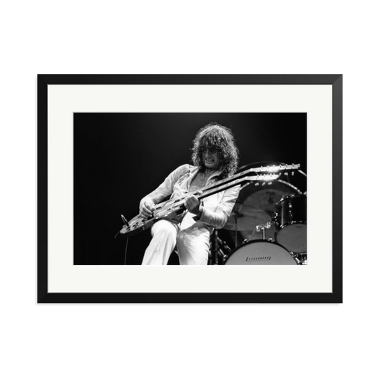Jimmy Page playing on tour 1977 Framed Print