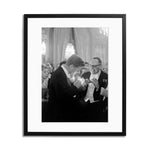 Kennedy in Paris Framed Print - Black