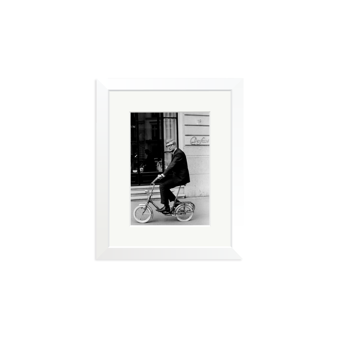 Michael Caine on His Bike Framed Print