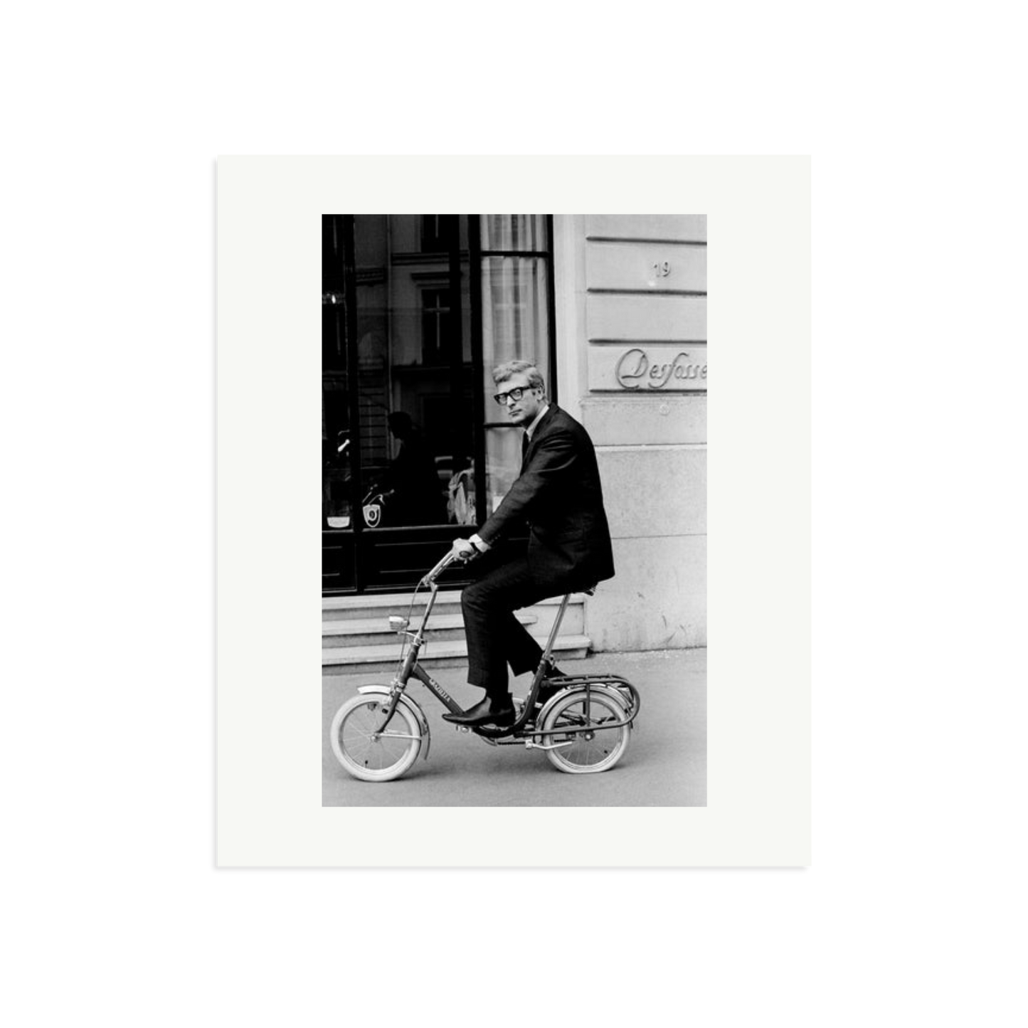 Michael Caine on His Bike Framed Print