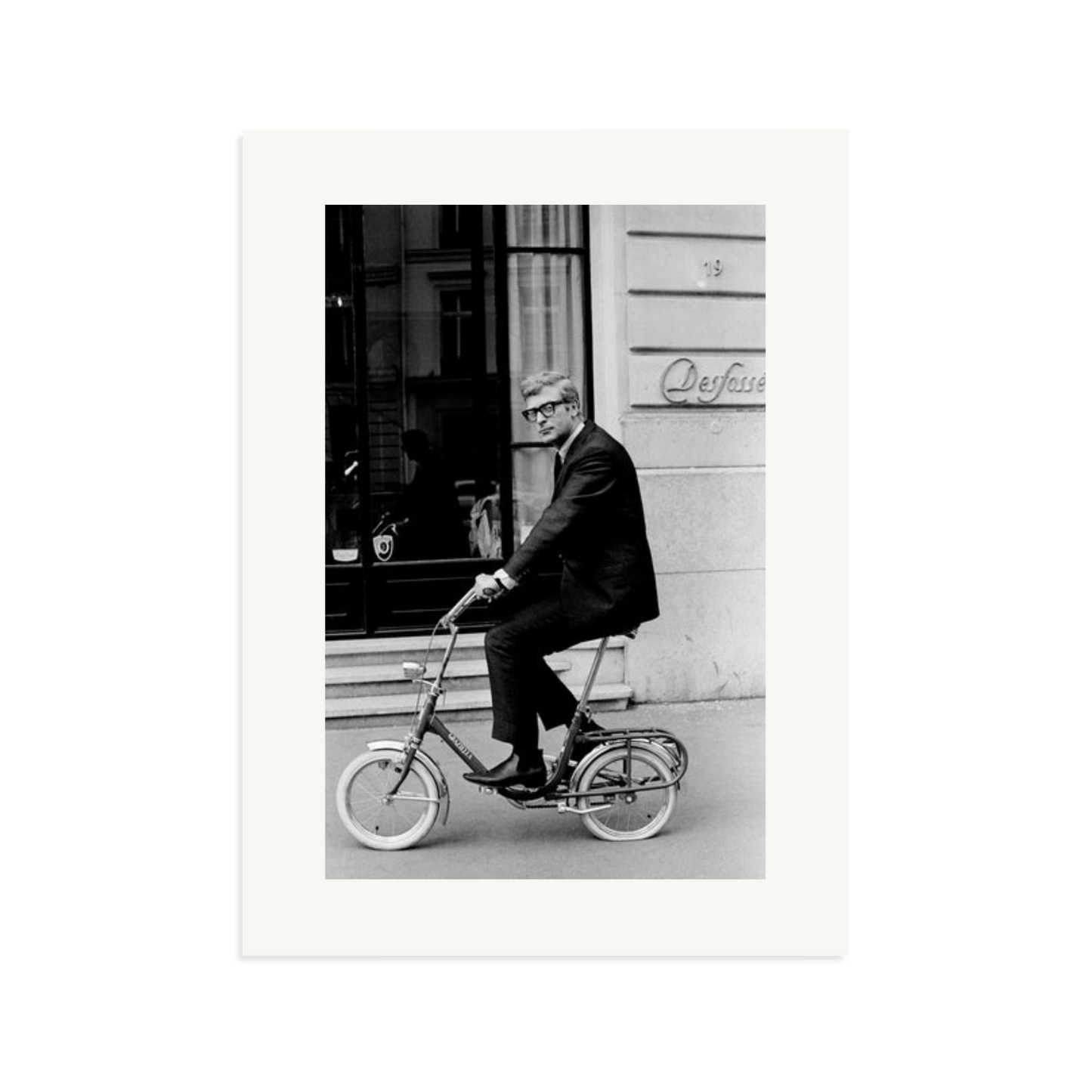 Michael Caine on His Bike Framed Print