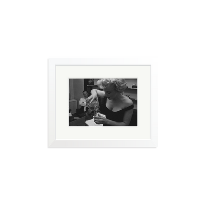 Marilyn Monroe Pouring A Drink Framed Print