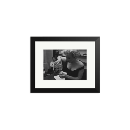 Marilyn Monroe Pouring A Drink Framed Print