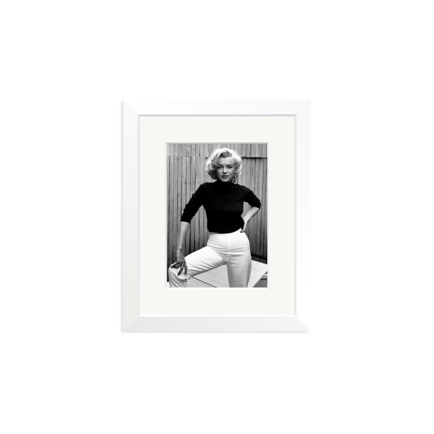 Marilyn Monroe Posing on Her Patio Framed Print