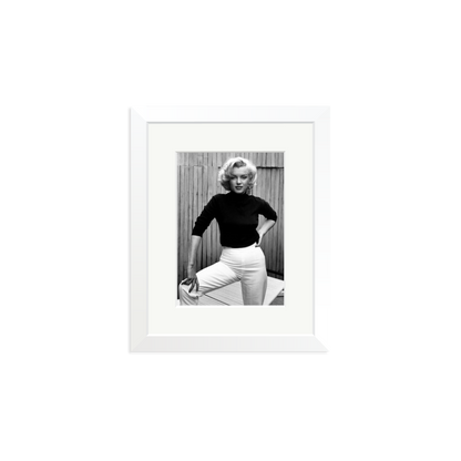 Marilyn Monroe Posing on Her Patio Framed Print