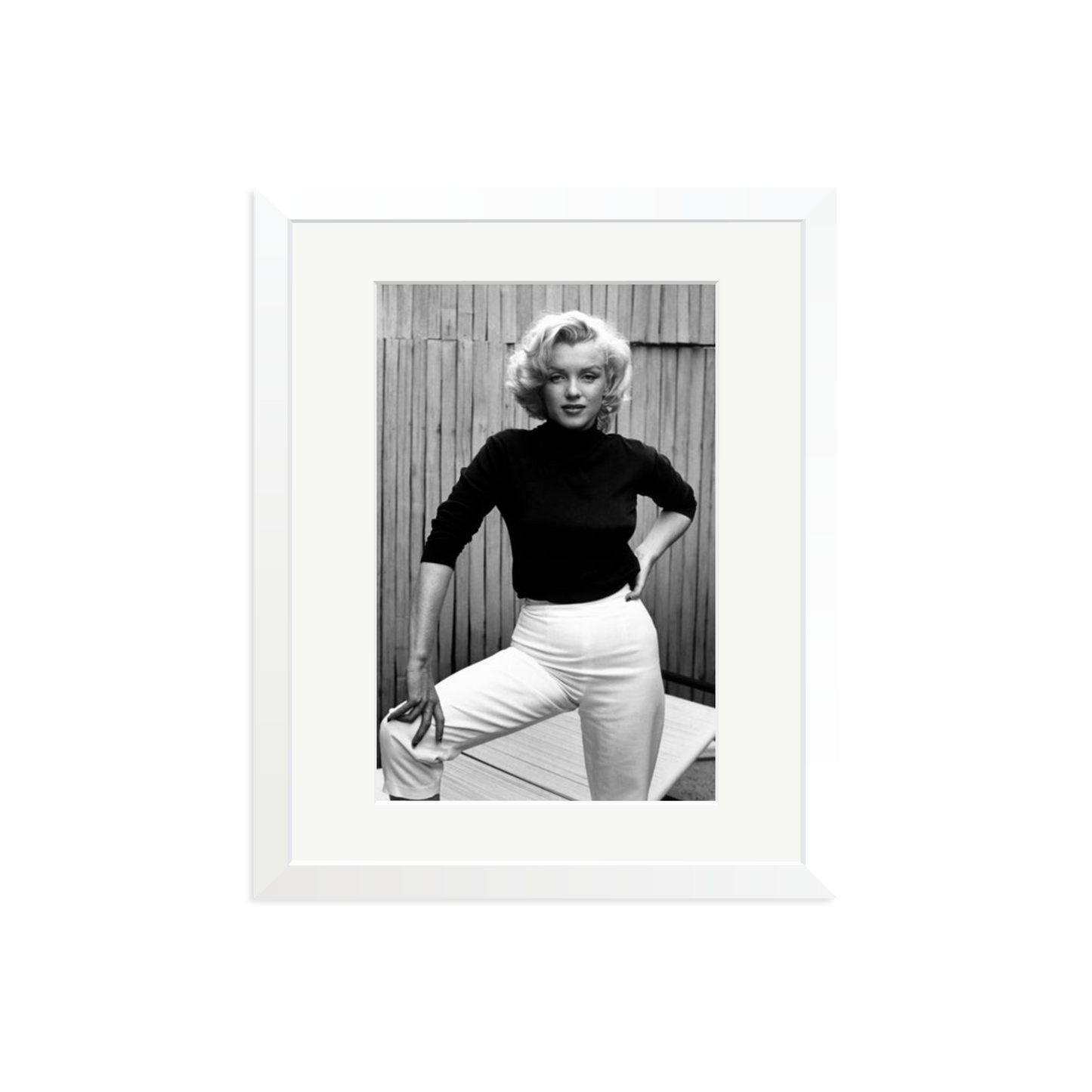 Marilyn Monroe Posing on Her Patio Framed Print