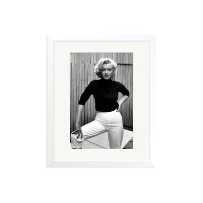 Marilyn Monroe Posing on Her Patio Framed Print
