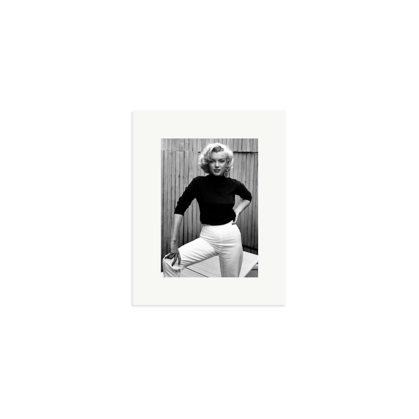 Marilyn Monroe Posing on Her Patio Framed Print