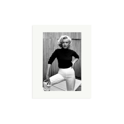 Marilyn Monroe Posing on Her Patio Framed Print