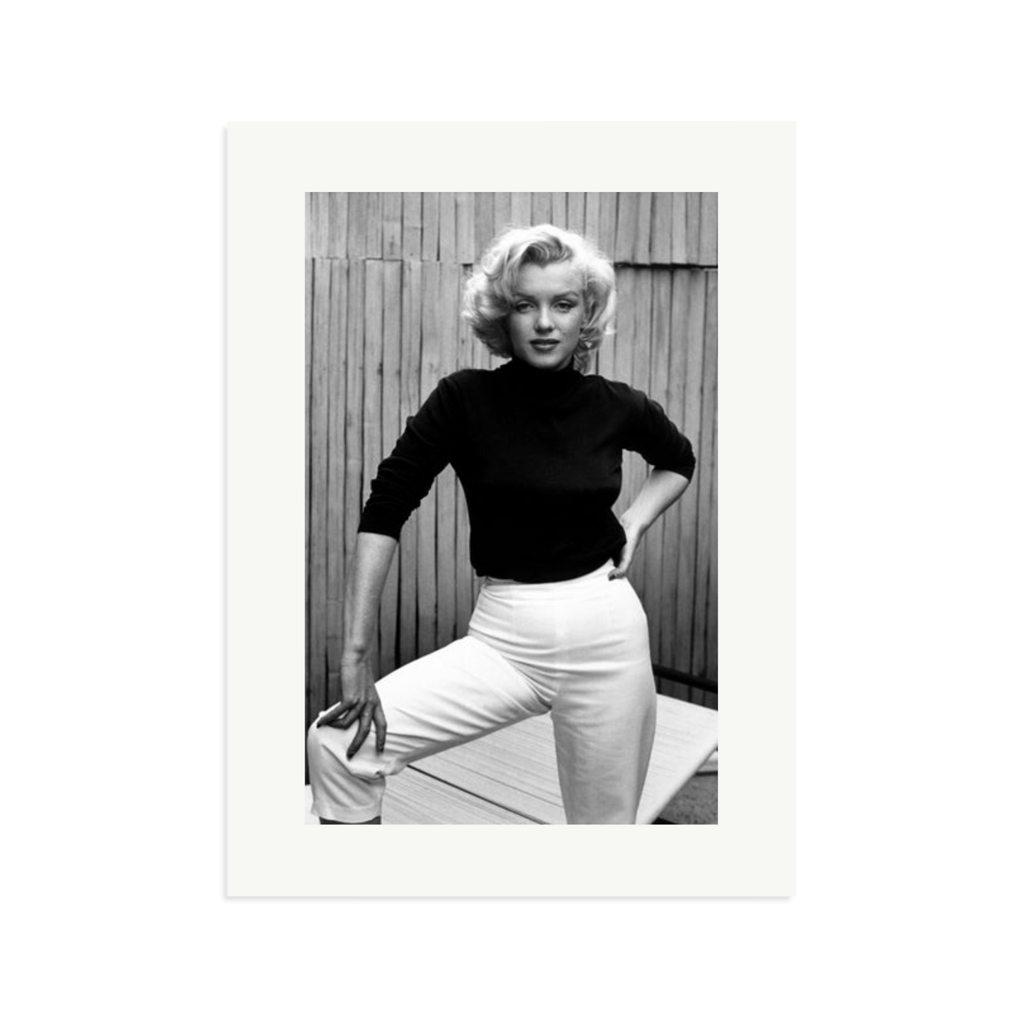 Marilyn Monroe Posing on Her Patio Framed Print