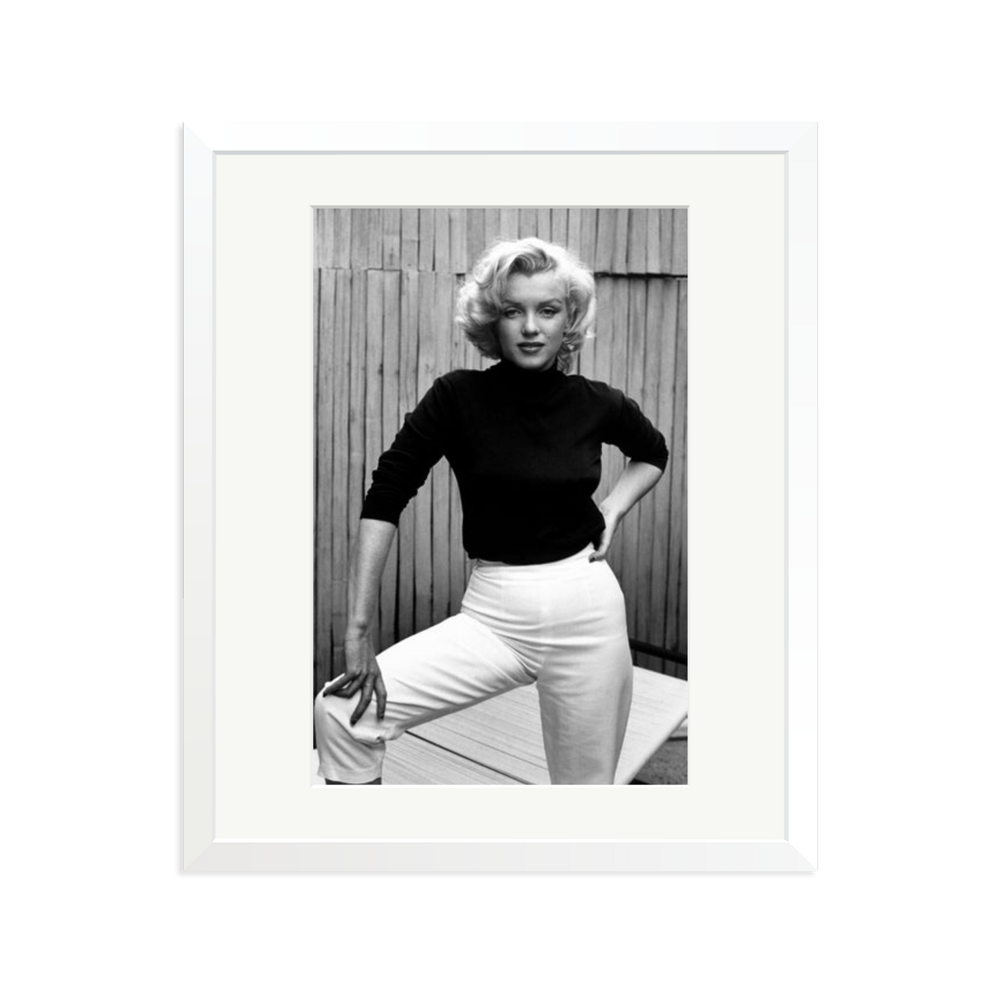 Marilyn Monroe Posing on Her Patio Framed Print