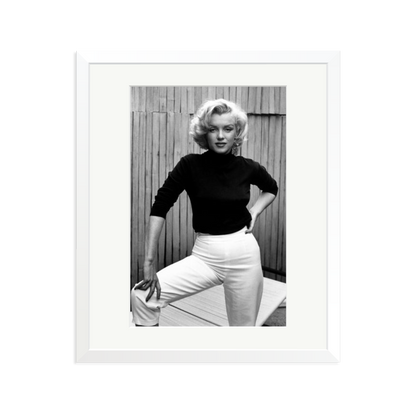 Marilyn Monroe Posing on Her Patio Framed Print