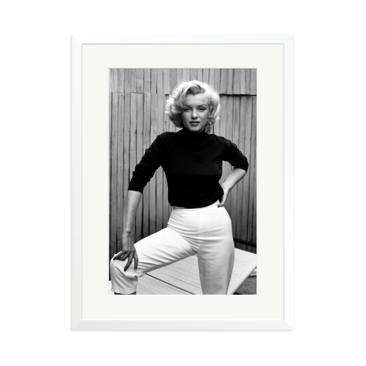Marilyn Monroe Posing on Her Patio Framed Print