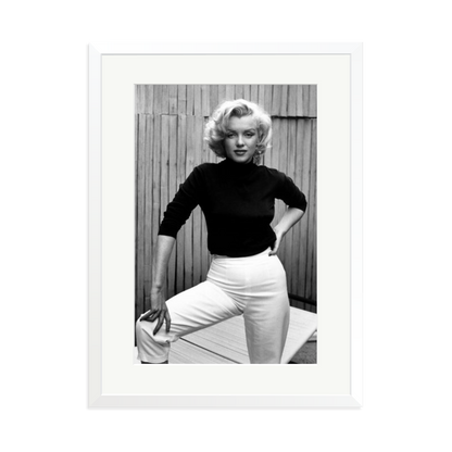 Marilyn Monroe Posing on Her Patio Framed Print