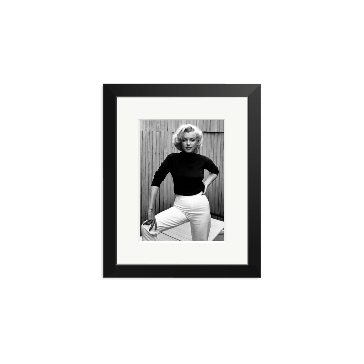 Marilyn Monroe Posing on Her Patio Framed Print