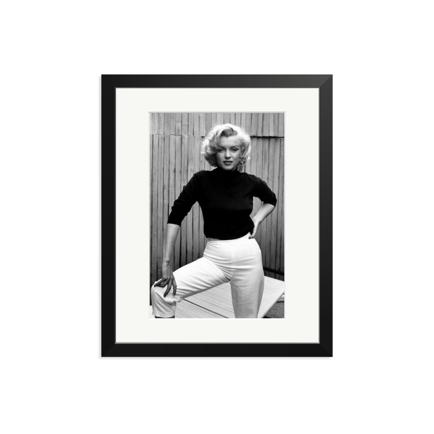 Marilyn Monroe Posing on Her Patio Framed Print
